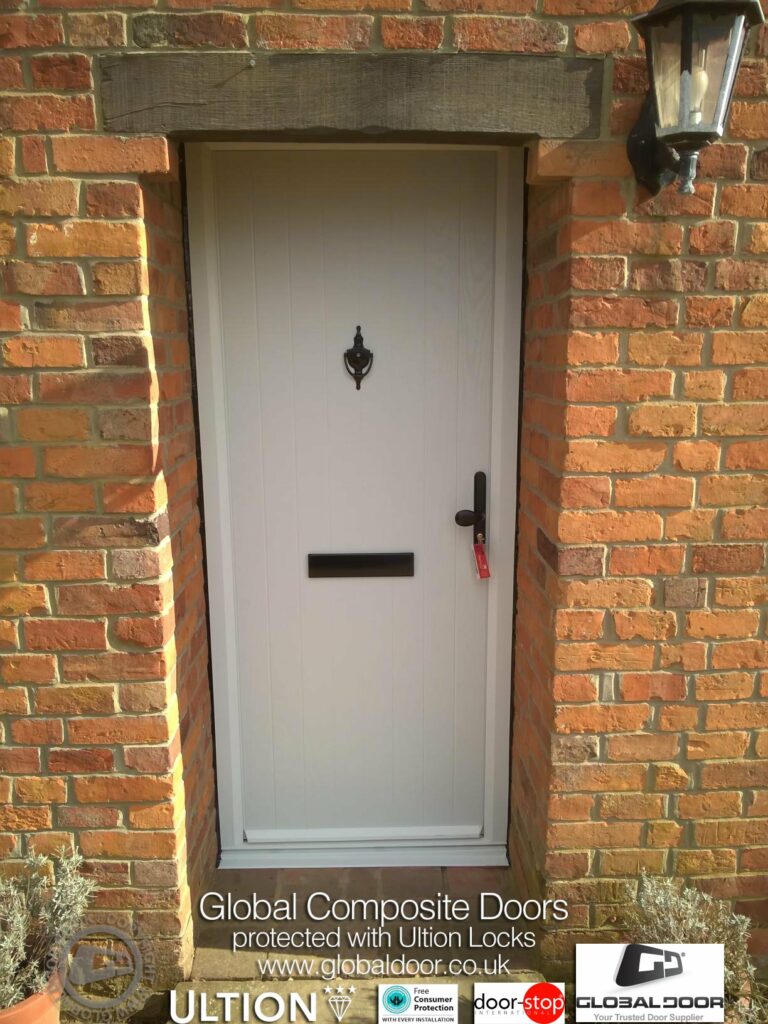 The ultimate boundary: A solid Door-Stop Cottage composite door, perfectly installed by Global Door to provide maximum privacy and thermal efficiency