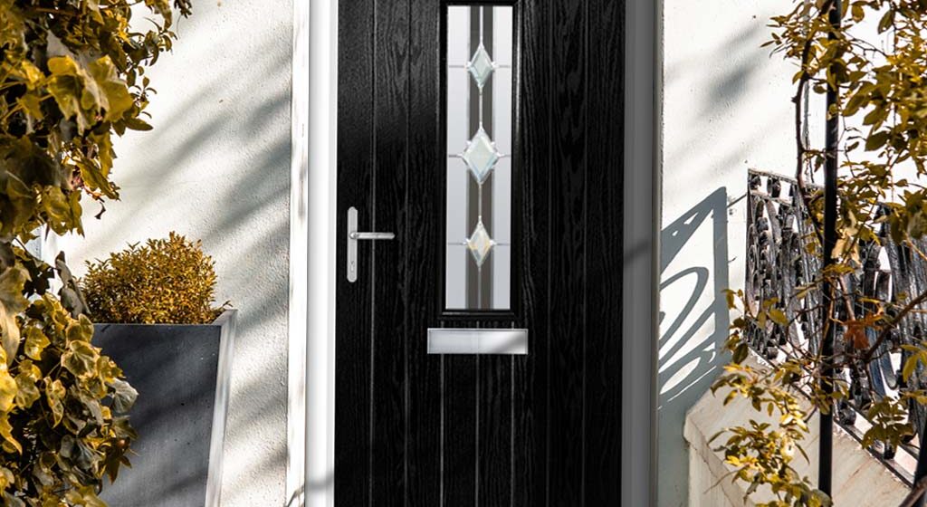 Black composite doors deliver bold kerb appeal, long-lasting colour, and modern style — without the cost of aluminium