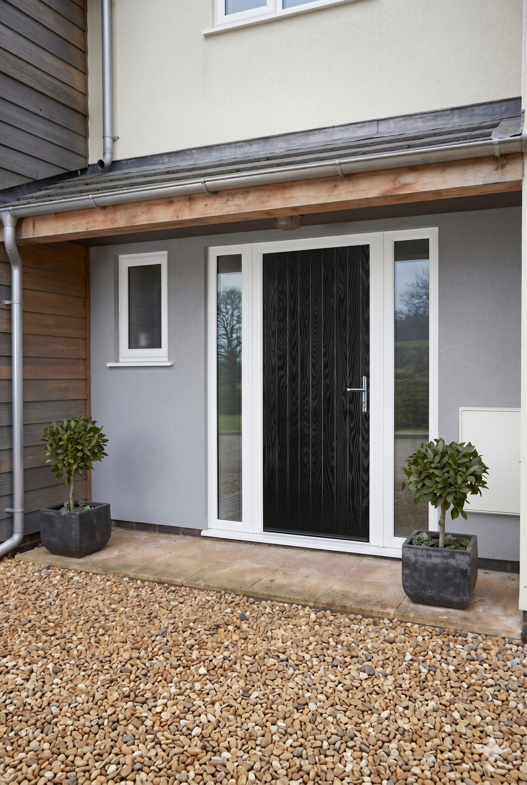 Bespoke beauty: A perfectly specified Cottage Door (R) from Global Door, customized to harmonize flawlessly with its architectural surroundings