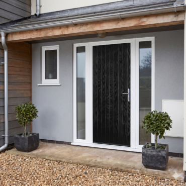 Bespoke beauty: A perfectly specified Cottage Door (R) from Global Door, customized to harmonize flawlessly with its architectural surroundings